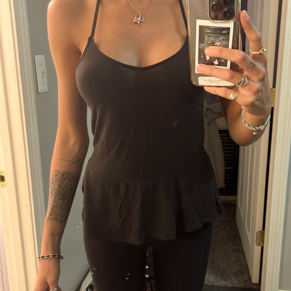 black tank top with ruffled bottom